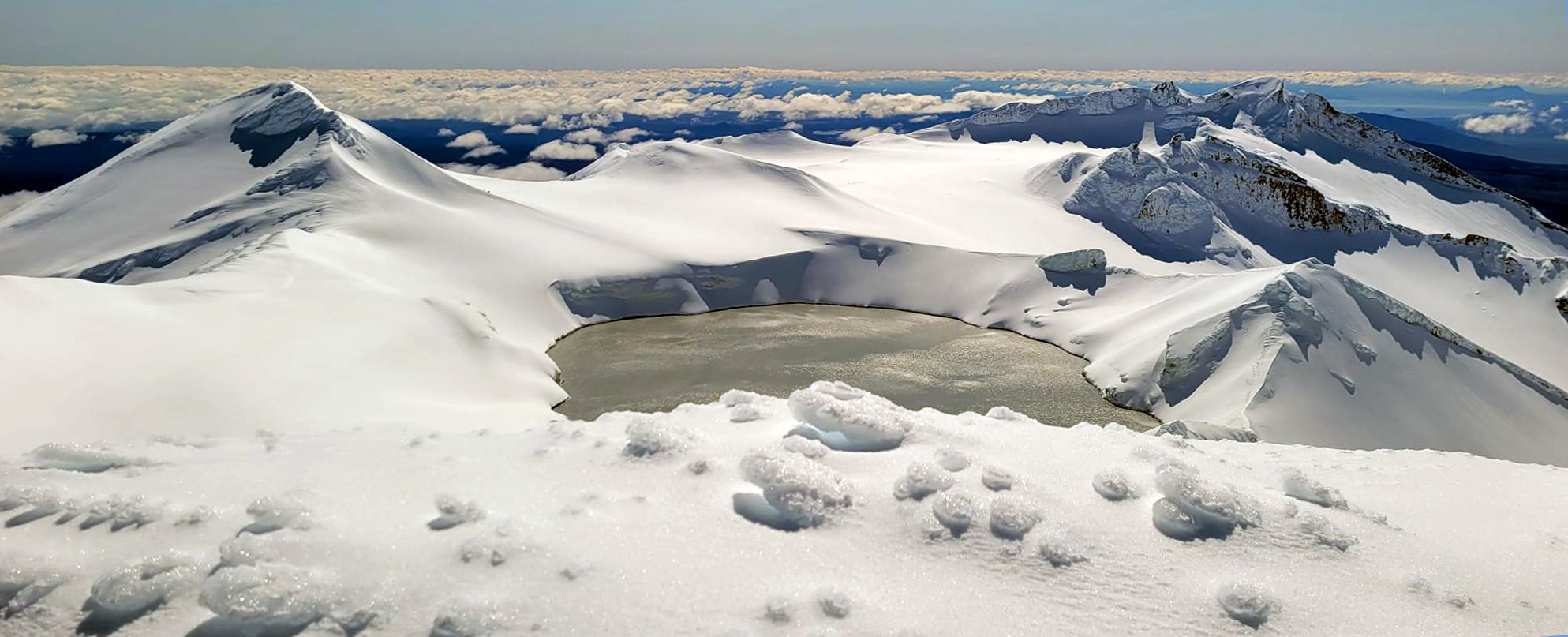 Summit view of snowfields and Crater Lake of Mt.Ruapehu