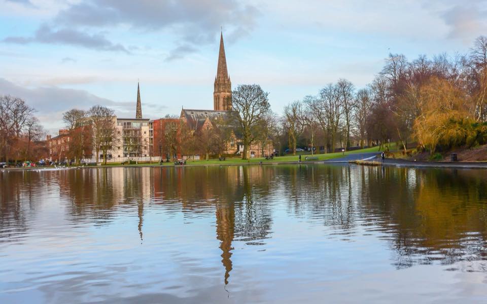 Boating pond and Queen's Park Baptist Church